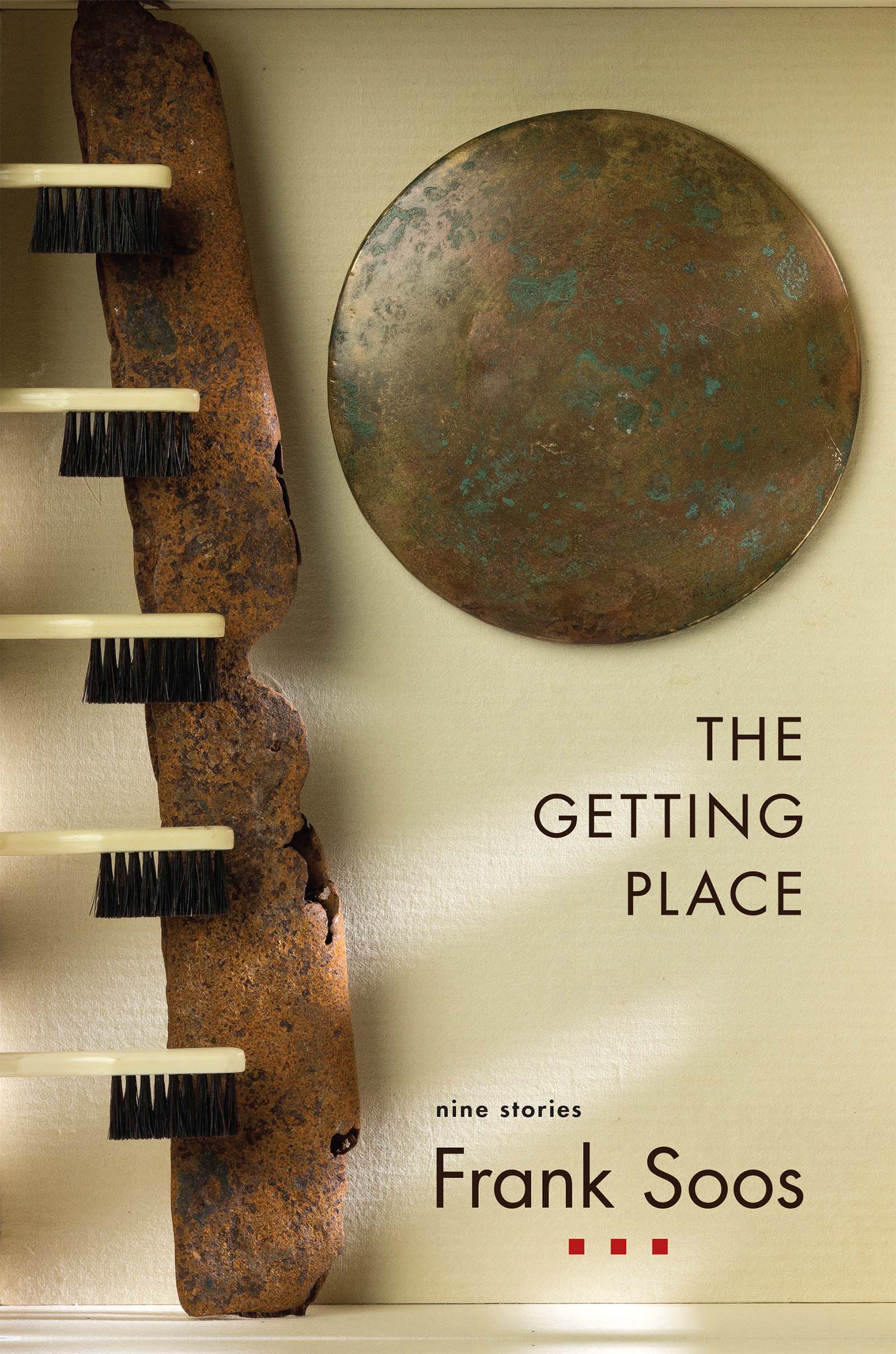 Artwork titled "Winter Birch" by Margo Klass depicts a photograph of five ascending toothbrush heads equidistant to each other, in front of a piece of petrified birch wood and a rusting metal disk with brown text stating "The Getting Place", nine stories by Frank Soos
